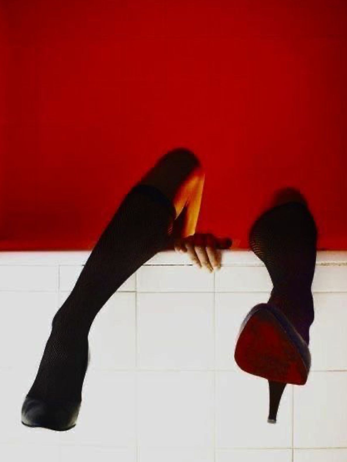 Footwear against red