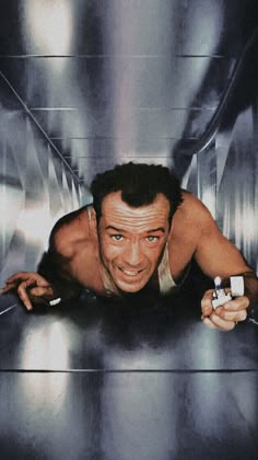Man crawling through ductwork
