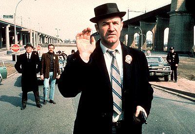 Man in Fedora Waving