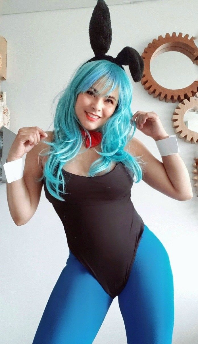 Cosplayer in Blue Wig and Bodysuit