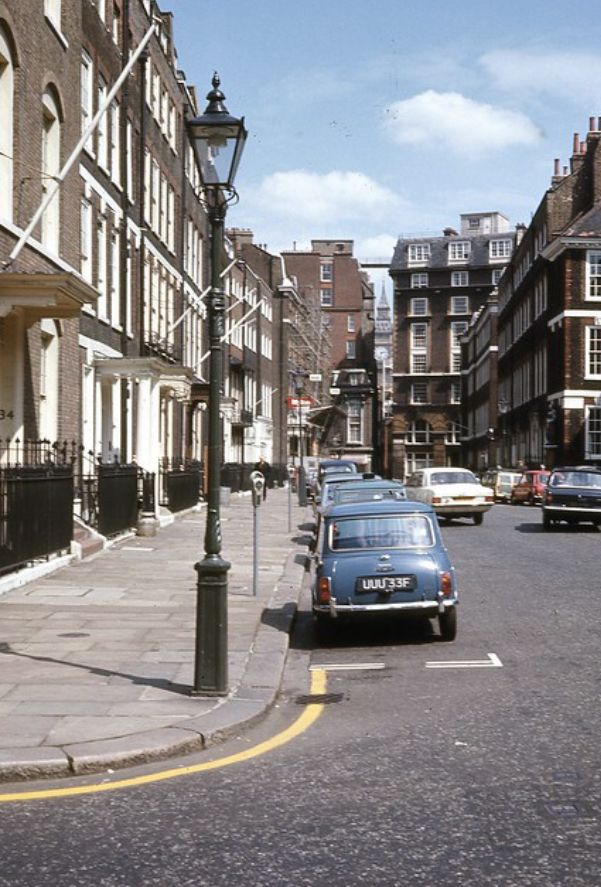 Vintage cars in a historic street