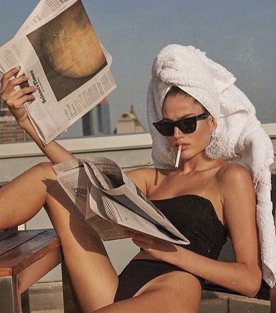 Woman Reading Newspaper Post-Spa