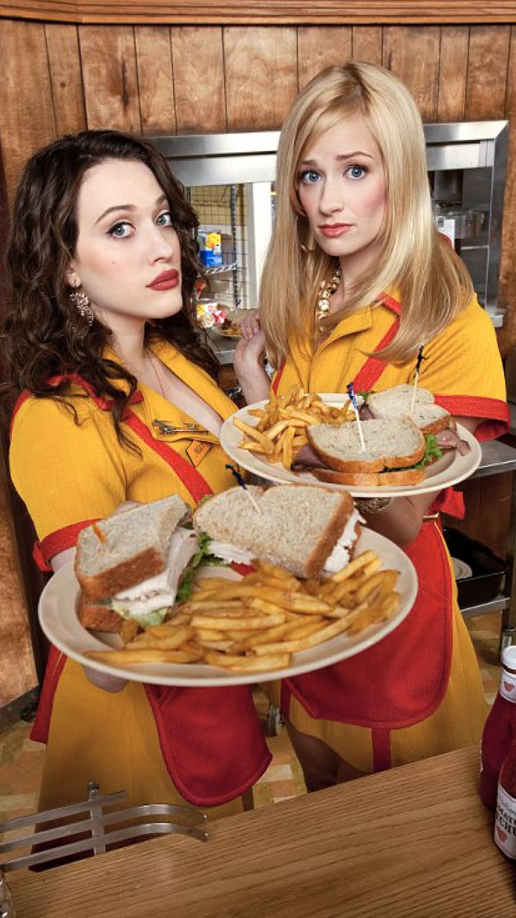 Waitresses Serving Sandwiches and Fries