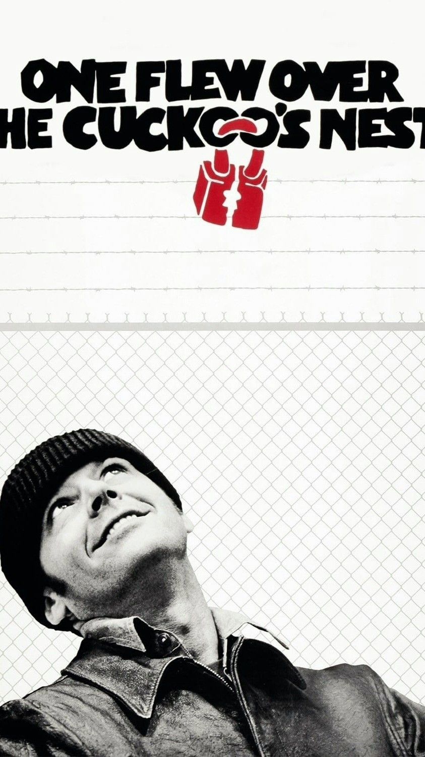 Man Looking Up at Red Robot