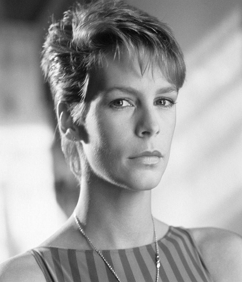 Short-haired woman in striped top