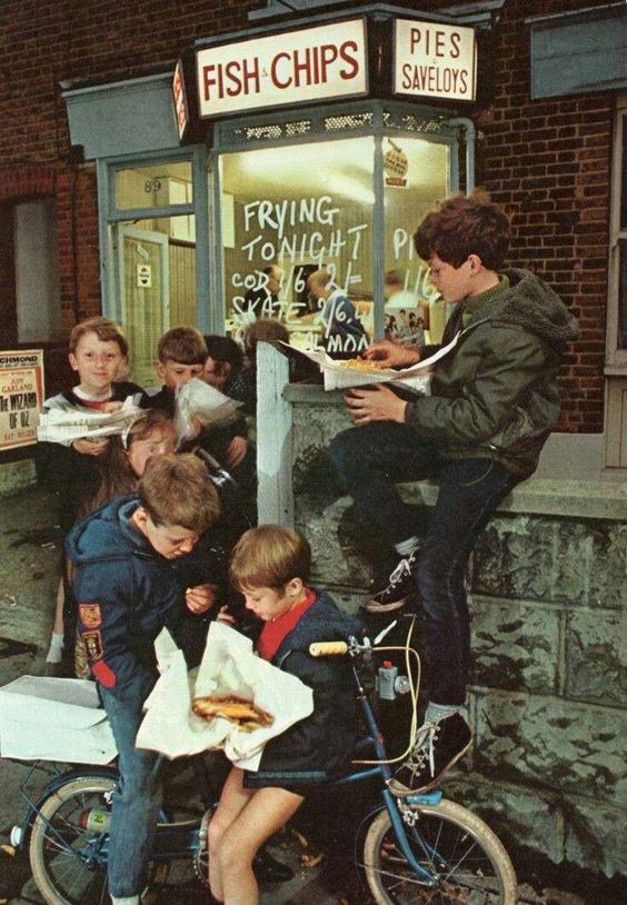 Boys Eating Hot Dogs Outside