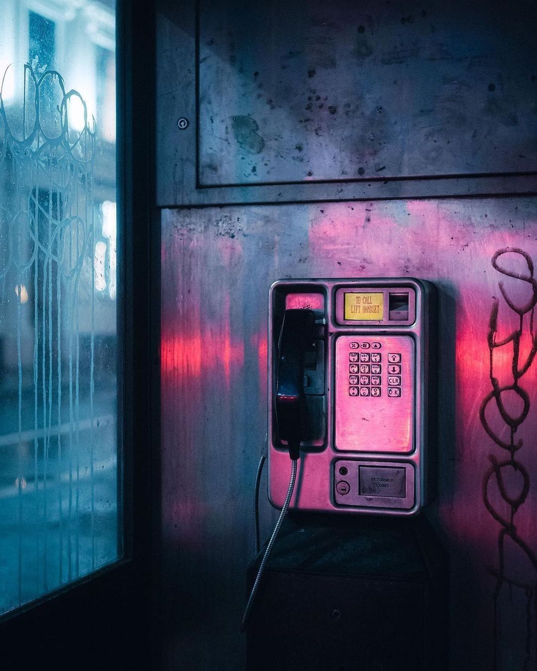 Vintage Payphone in Neon Light