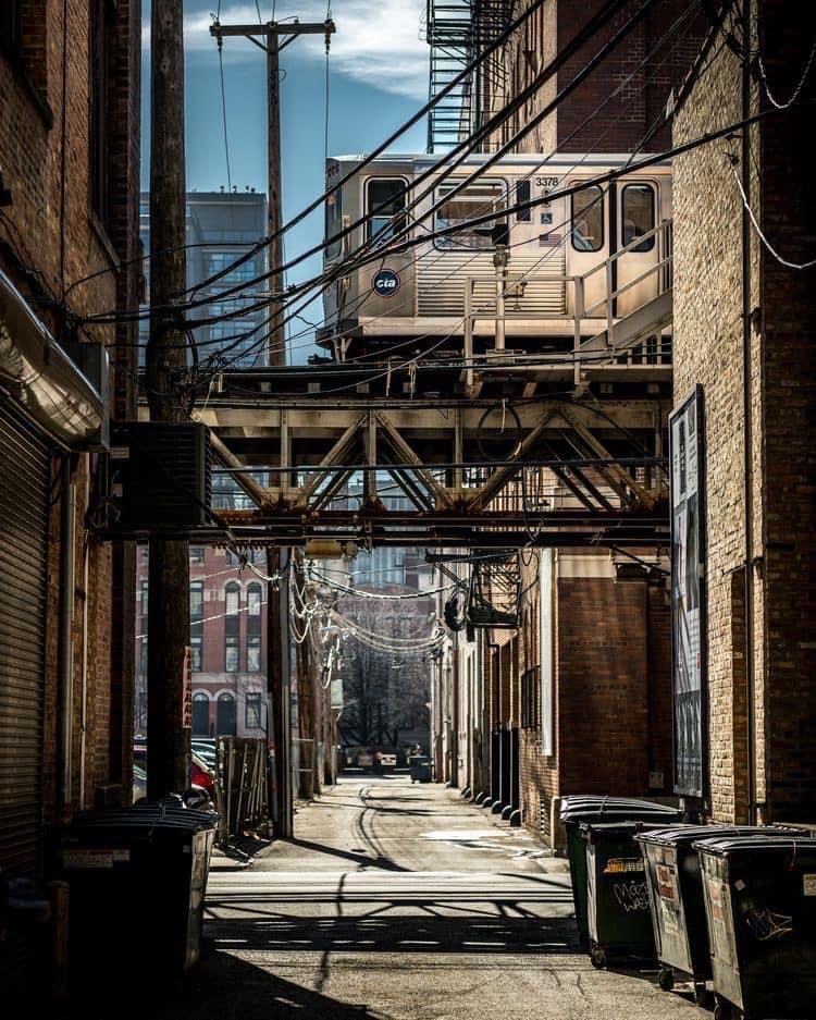 Urban Alleyway with Elevated Train