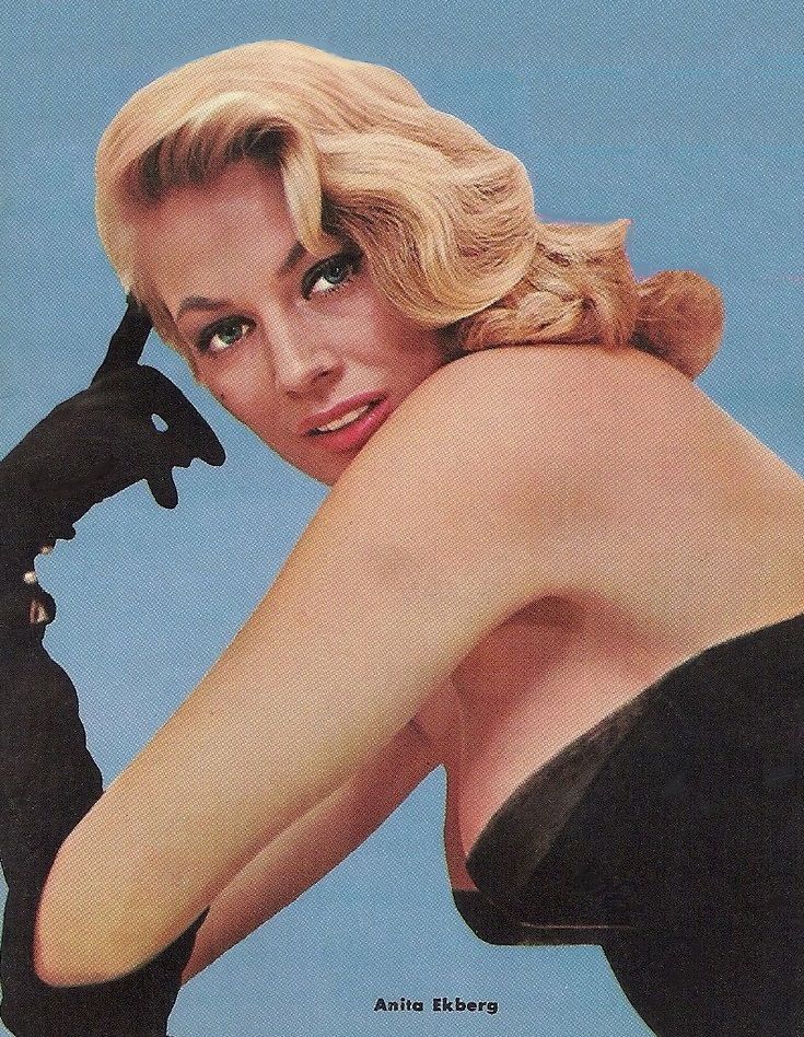 Blonde beauty in black dress