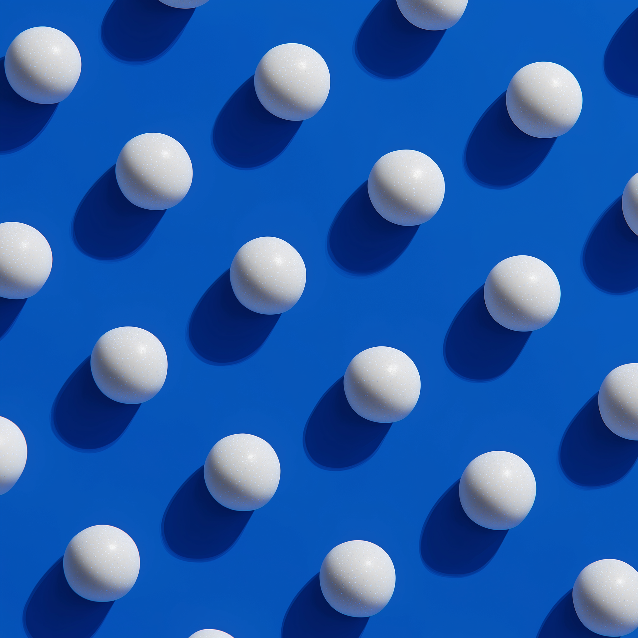 White Spheres on Blue Gradient