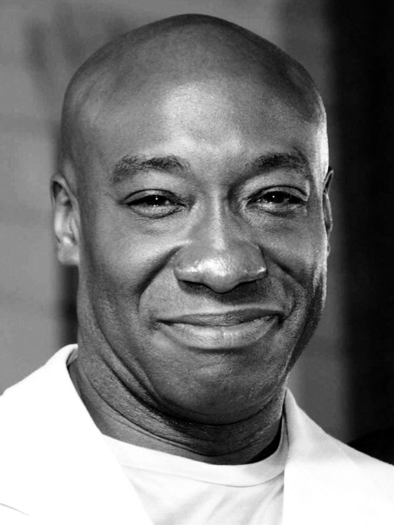 Smiling man with bald head