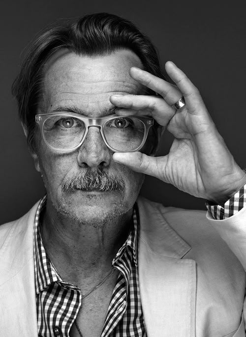 Man Adjusting Glasses