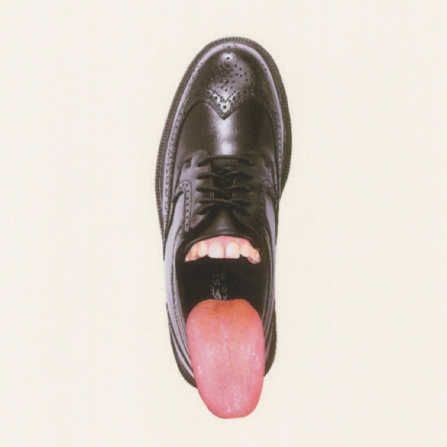 Tongue sticking out of a shoe