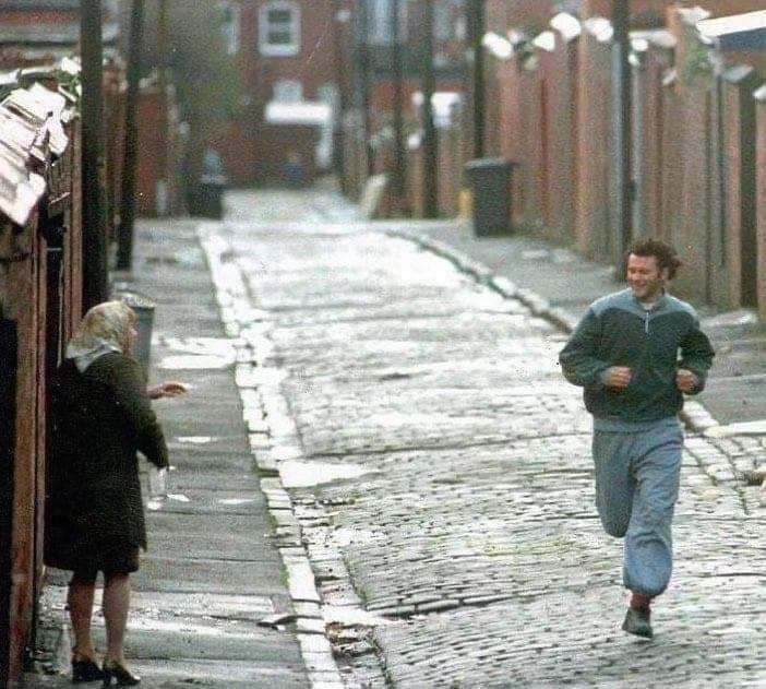 Ryan Giggs jogging past elderly woman