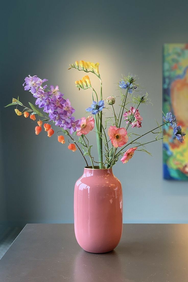 Colorful Flowers in Pink Vase