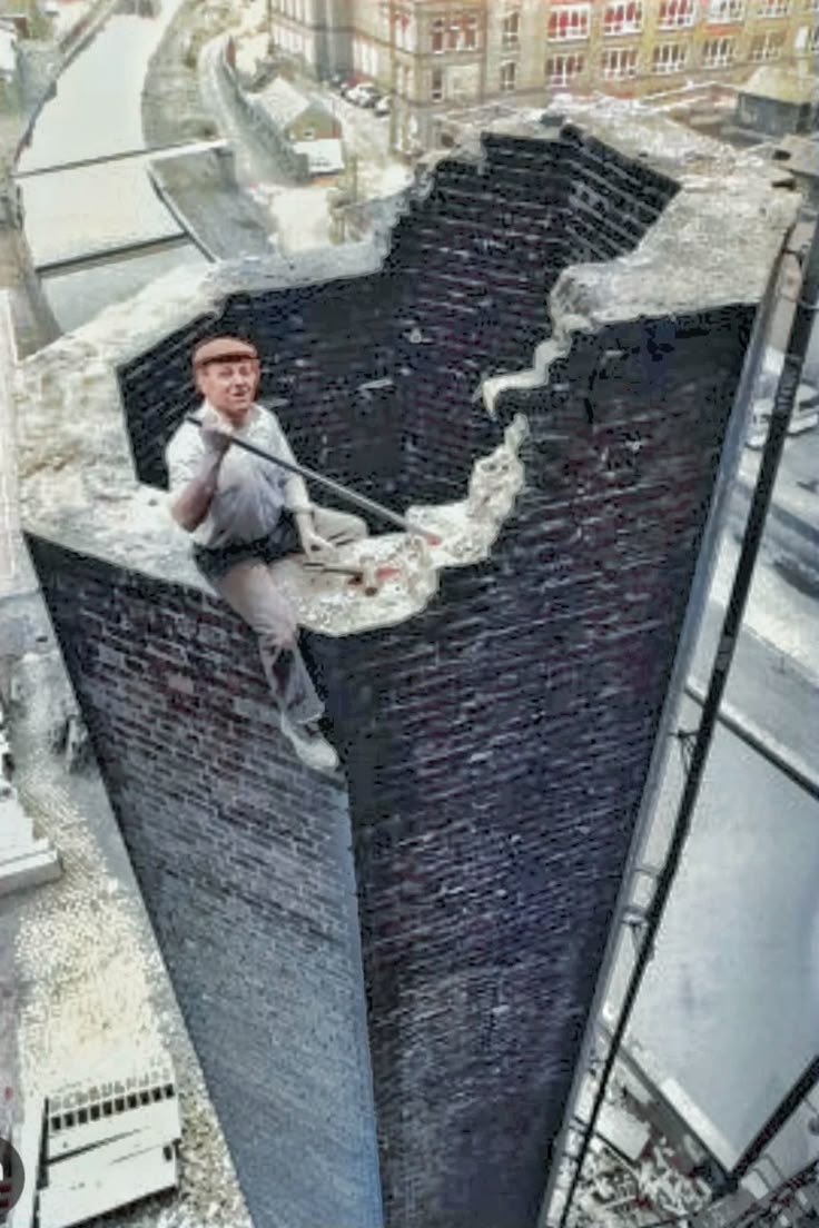 Man climbing brick wall