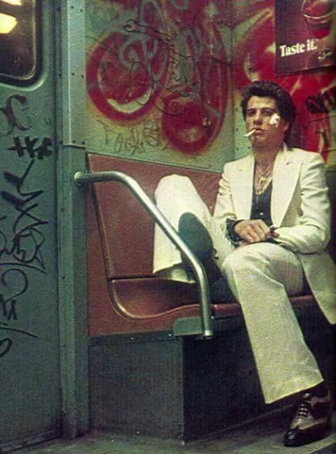 Man Smoking on Graffiti Subway