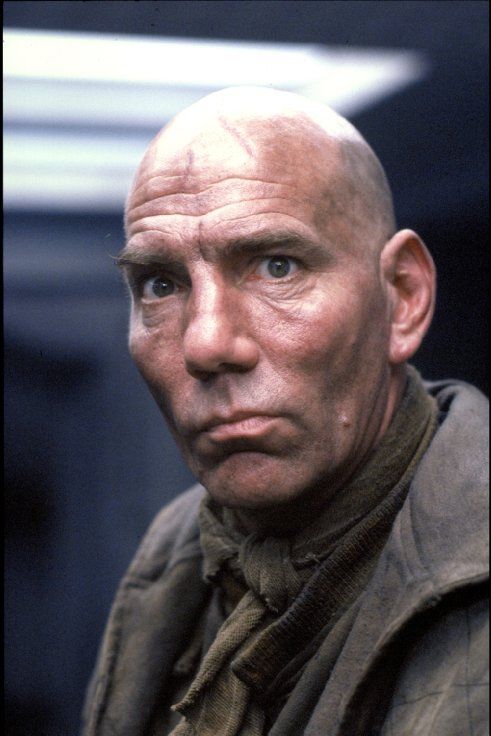 Bald Man in Military Uniform