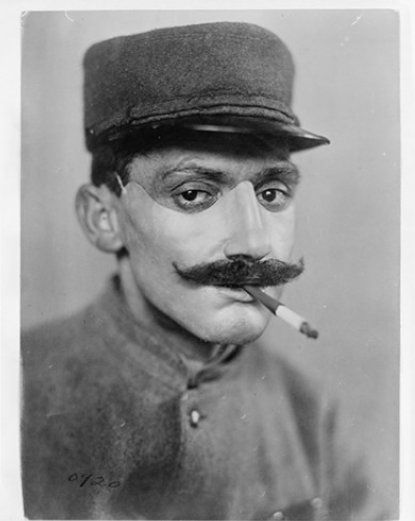 Man in Uniform Smoking