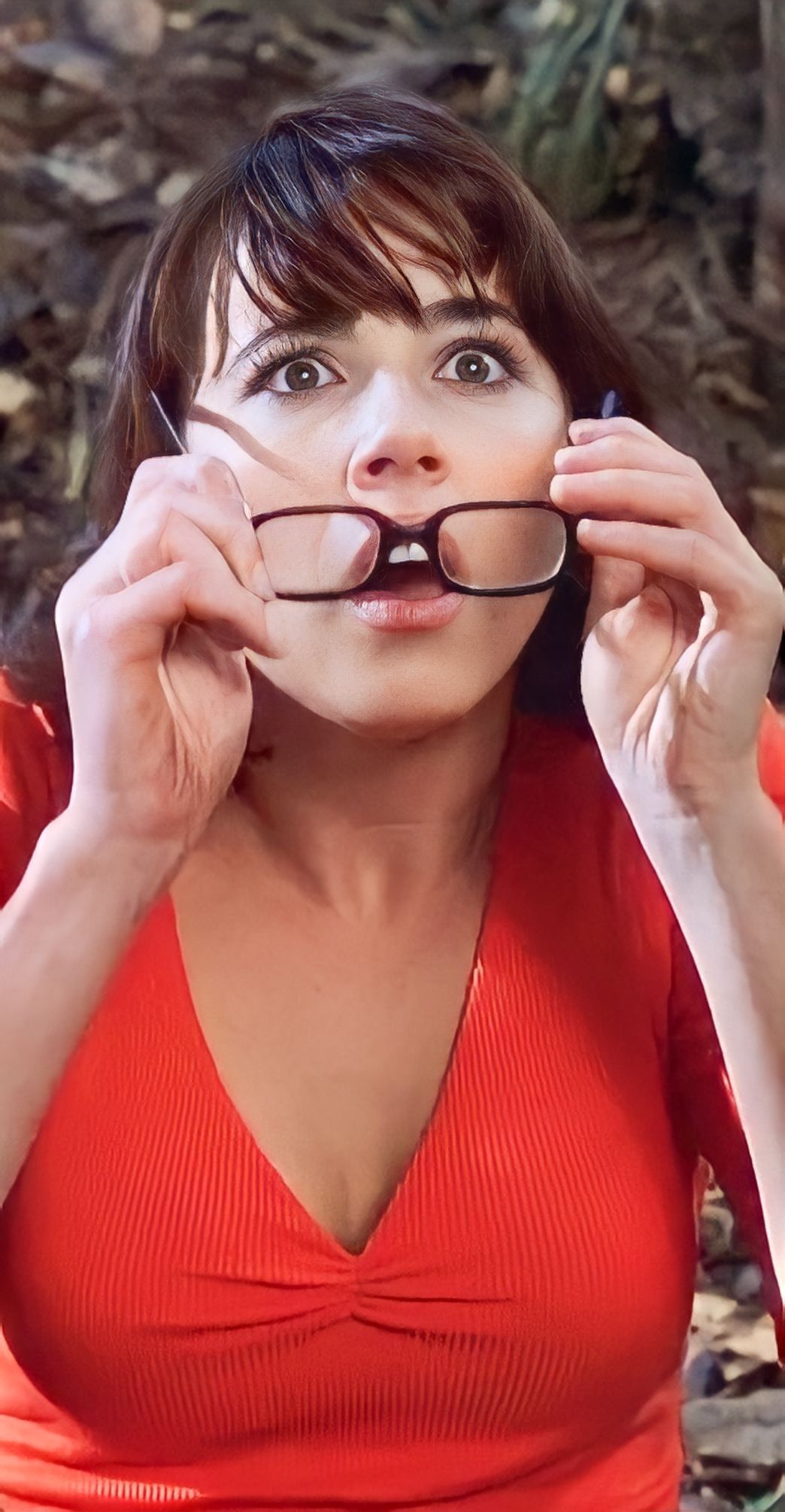 Woman Adjusting Glasses