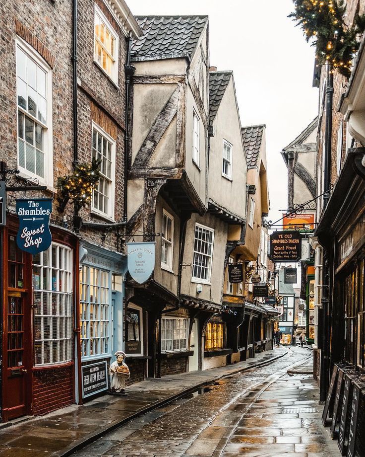 Narrow medieval street with shops