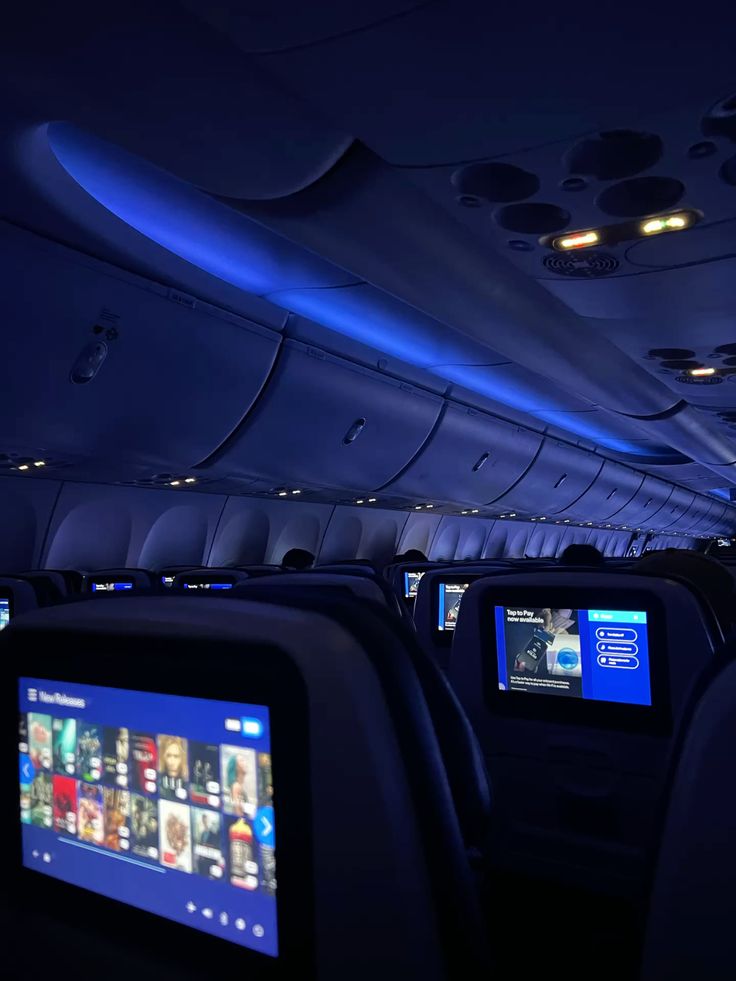 Airplane cabin with illuminated seats