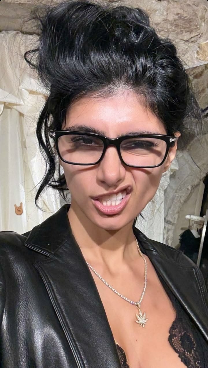 Woman in Glasses Smiling