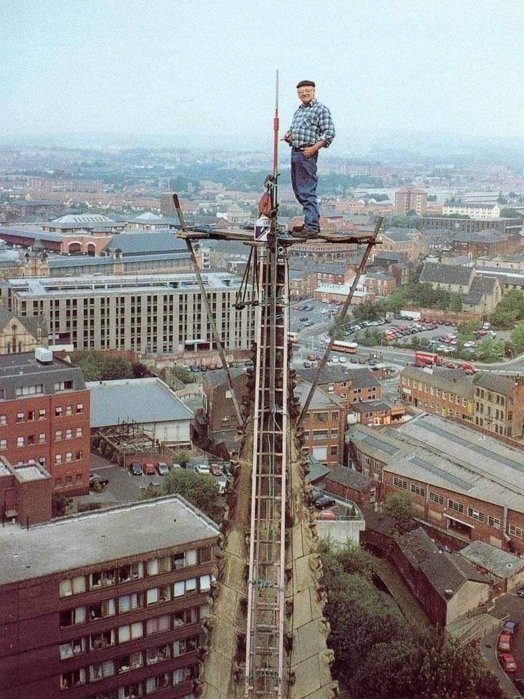Man atop cathedral spire