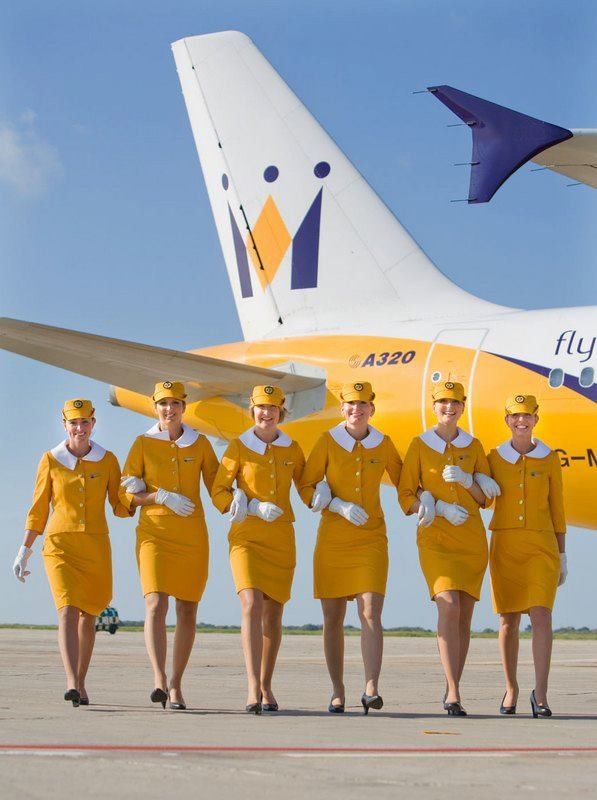 Airline Cabin Crew in Yellow Uniforms