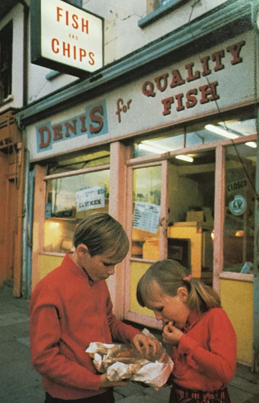 Children outside fish shop