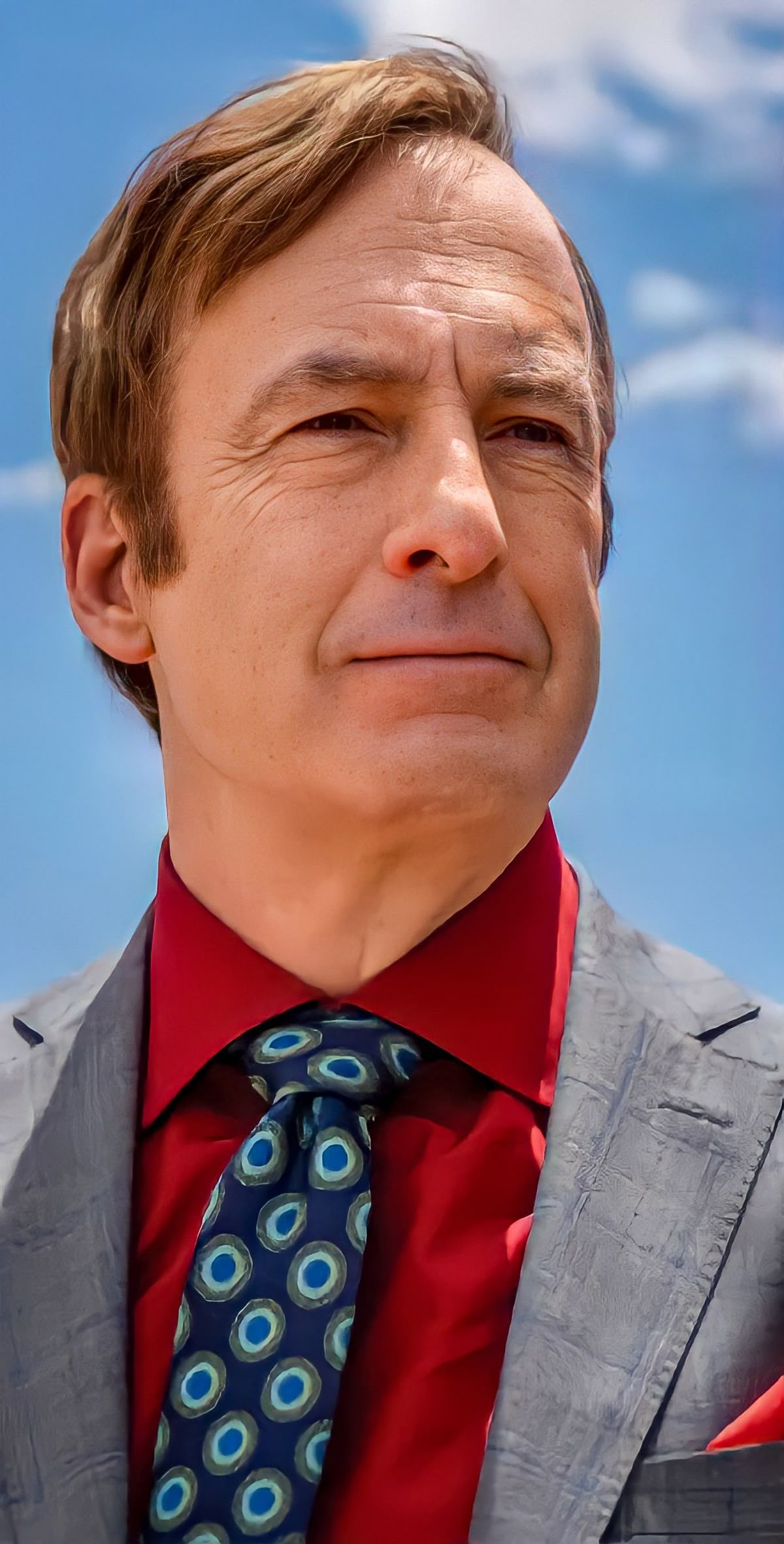 Man in Suit Against Blue Sky