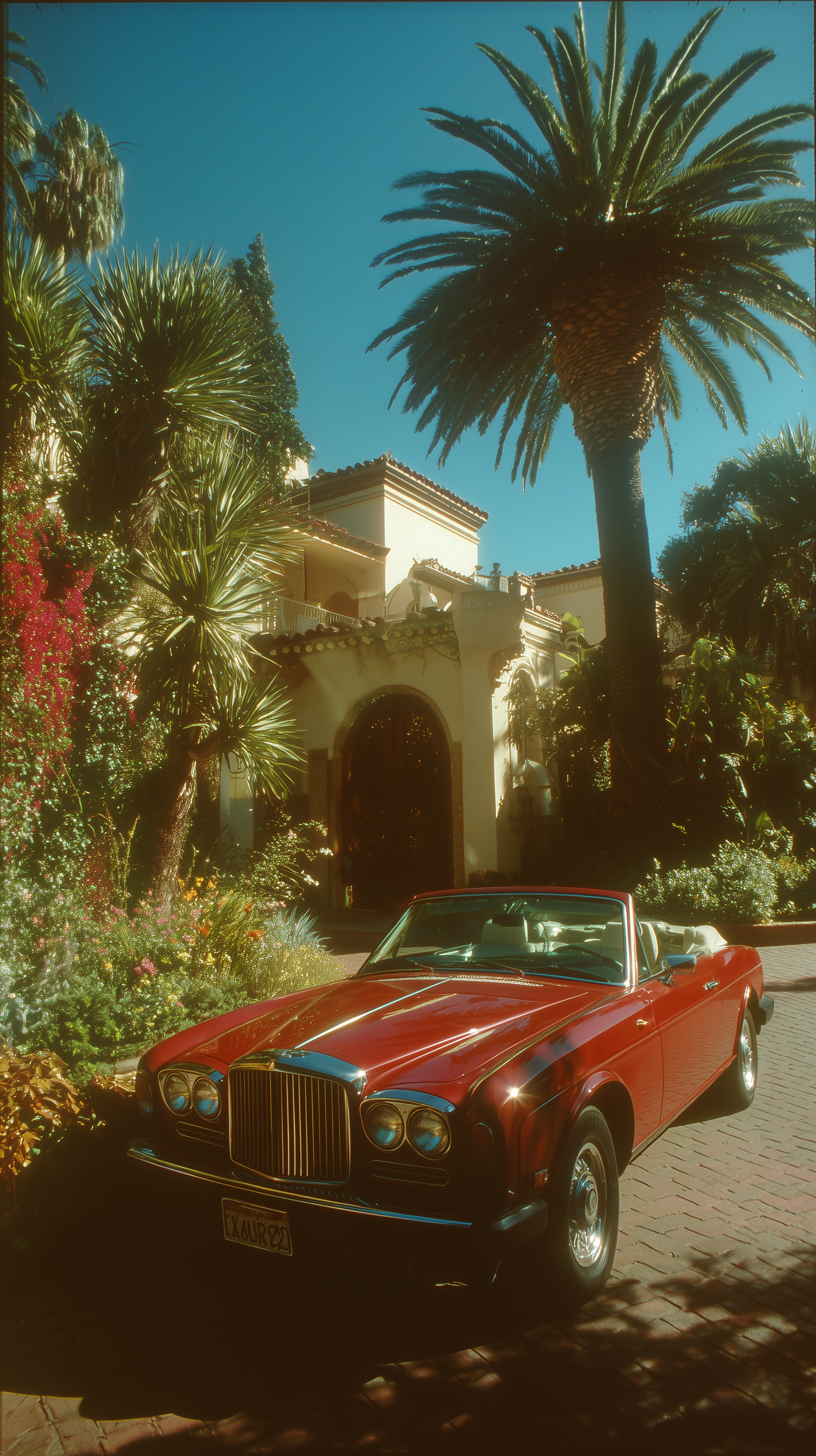Vintage Red Convertible in Front of Mediterranean Villa