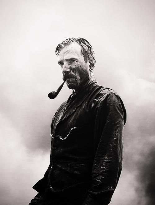Man Smoking Pipe in Leather Jacket