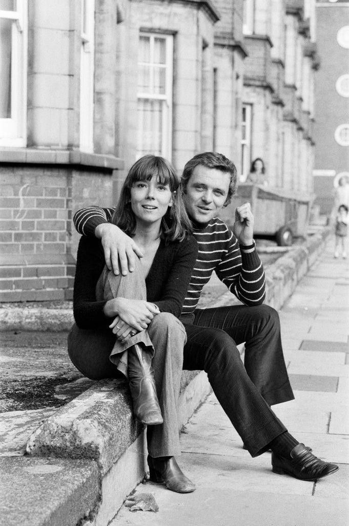 Couple sitting on steps