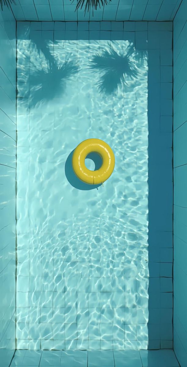 Yellow Inner Tube in Crystal Clear Pool