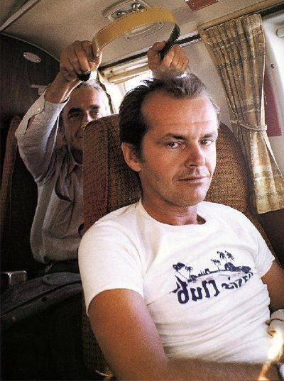 Man in White T-Shirt on Bus