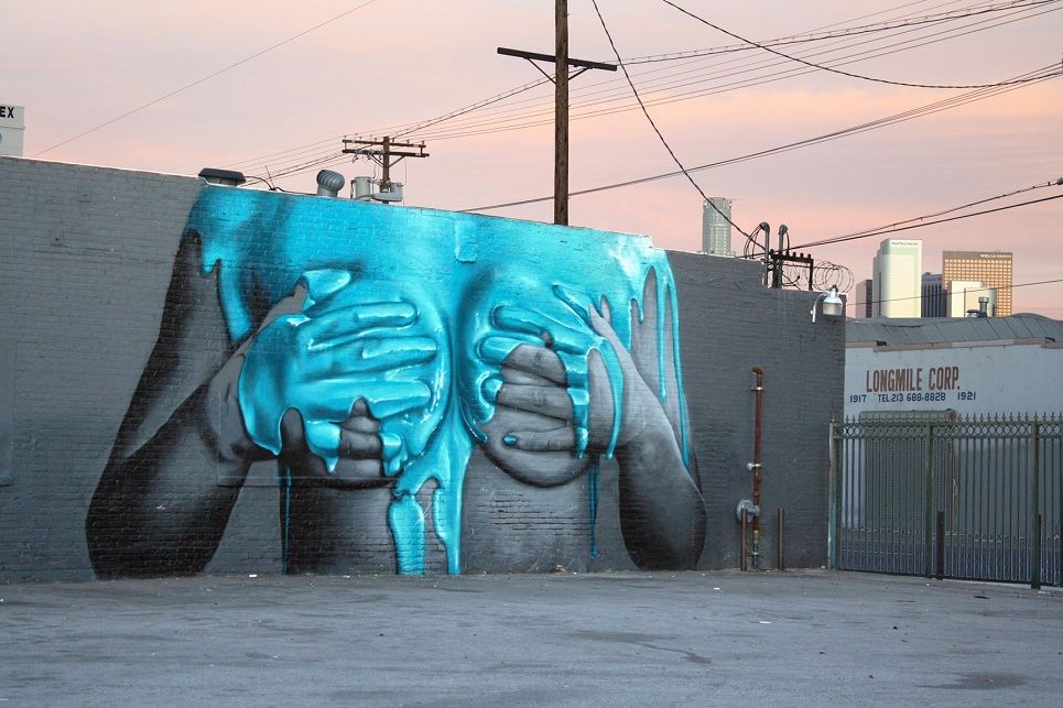 Giant Blue Hands Graffiti