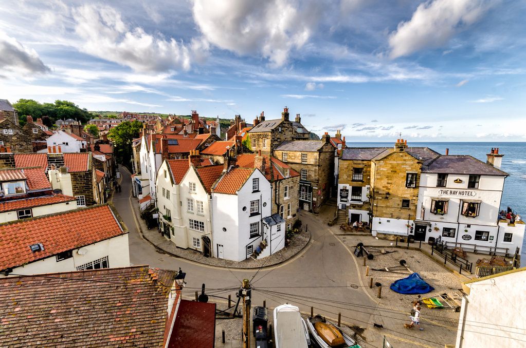Coastal Village with Red Roofs