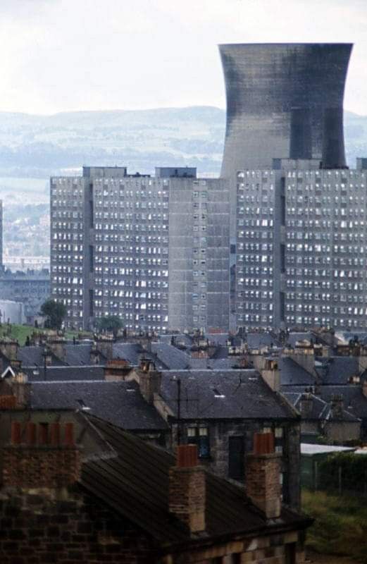 High-rise flats against industrial backdrop