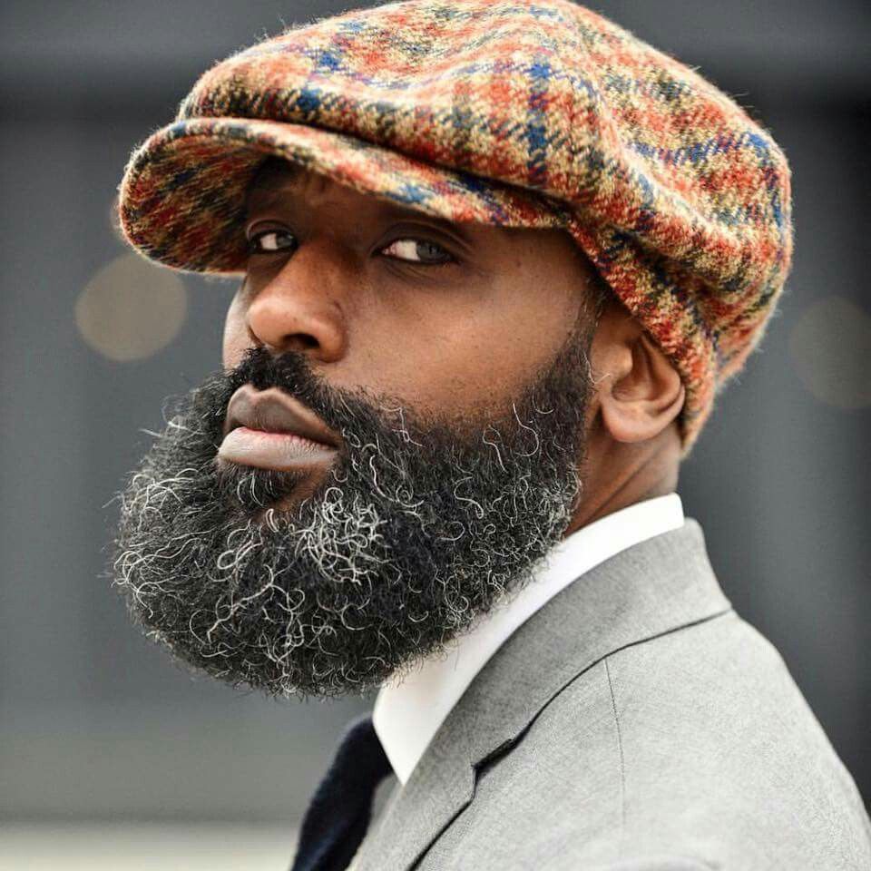Man with Beard in Plaid Cap