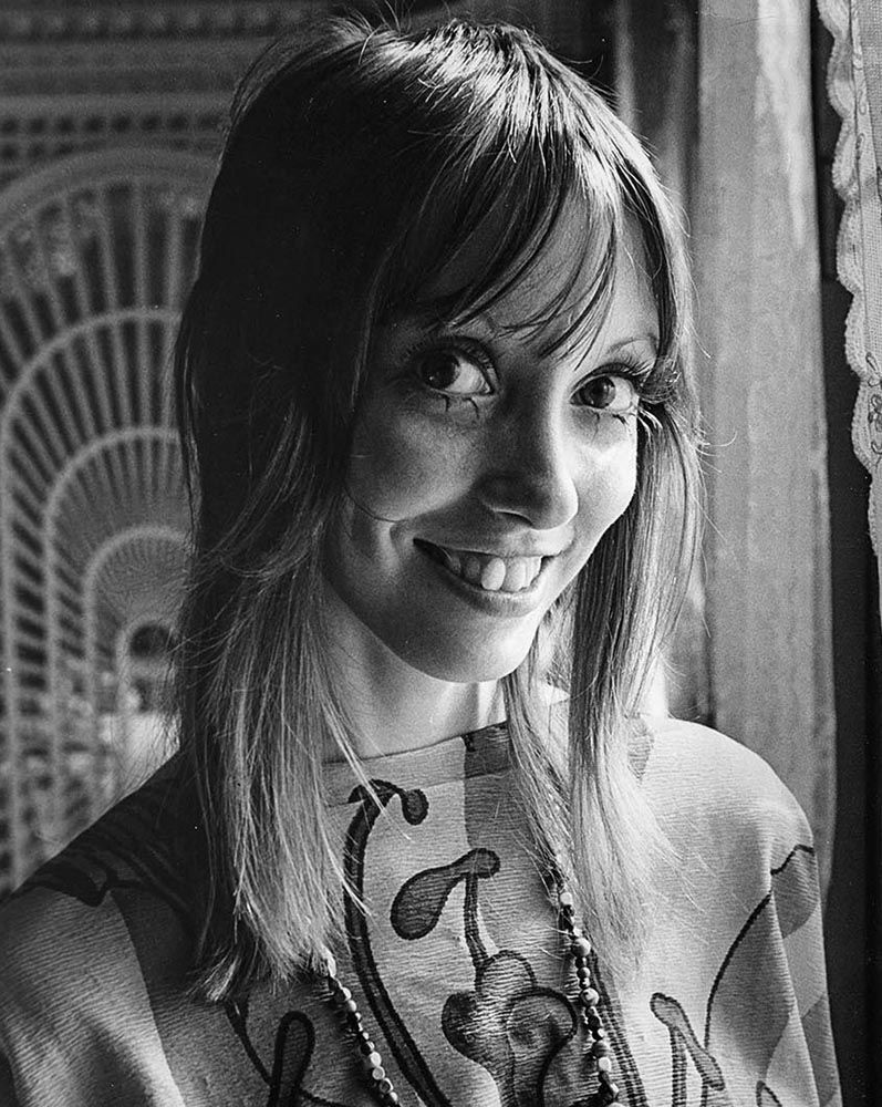 Smiling Woman with Long Hair