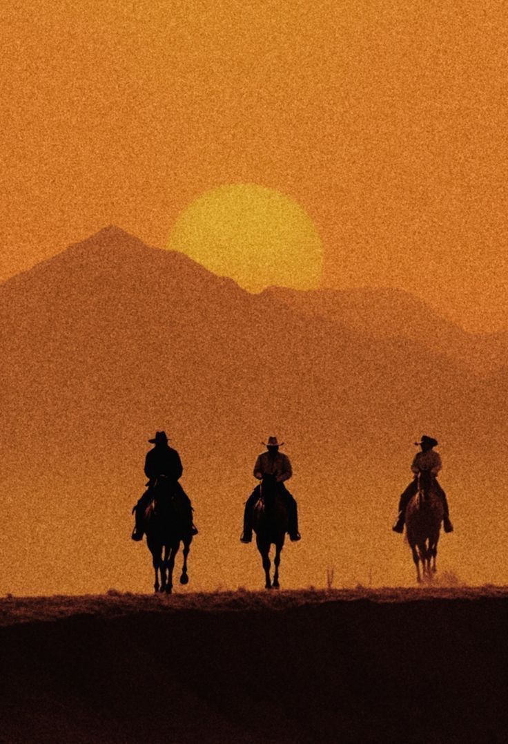 Cowboys at Sunset