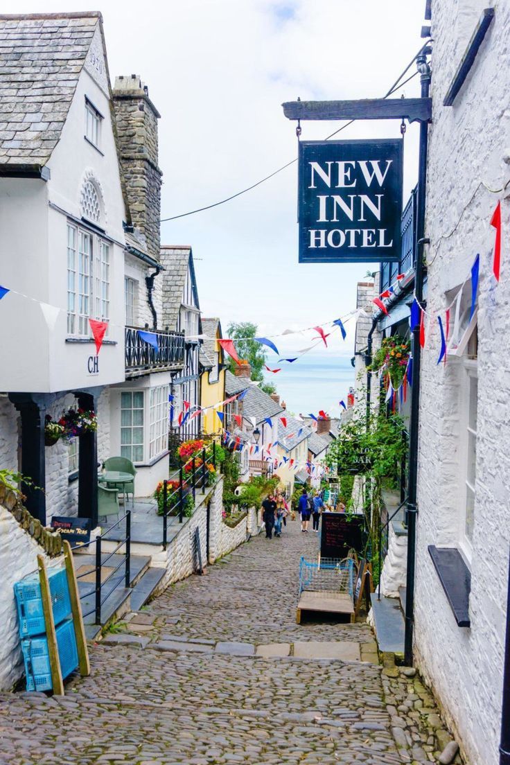 Cobbled Street with New Inn Hotel Sign