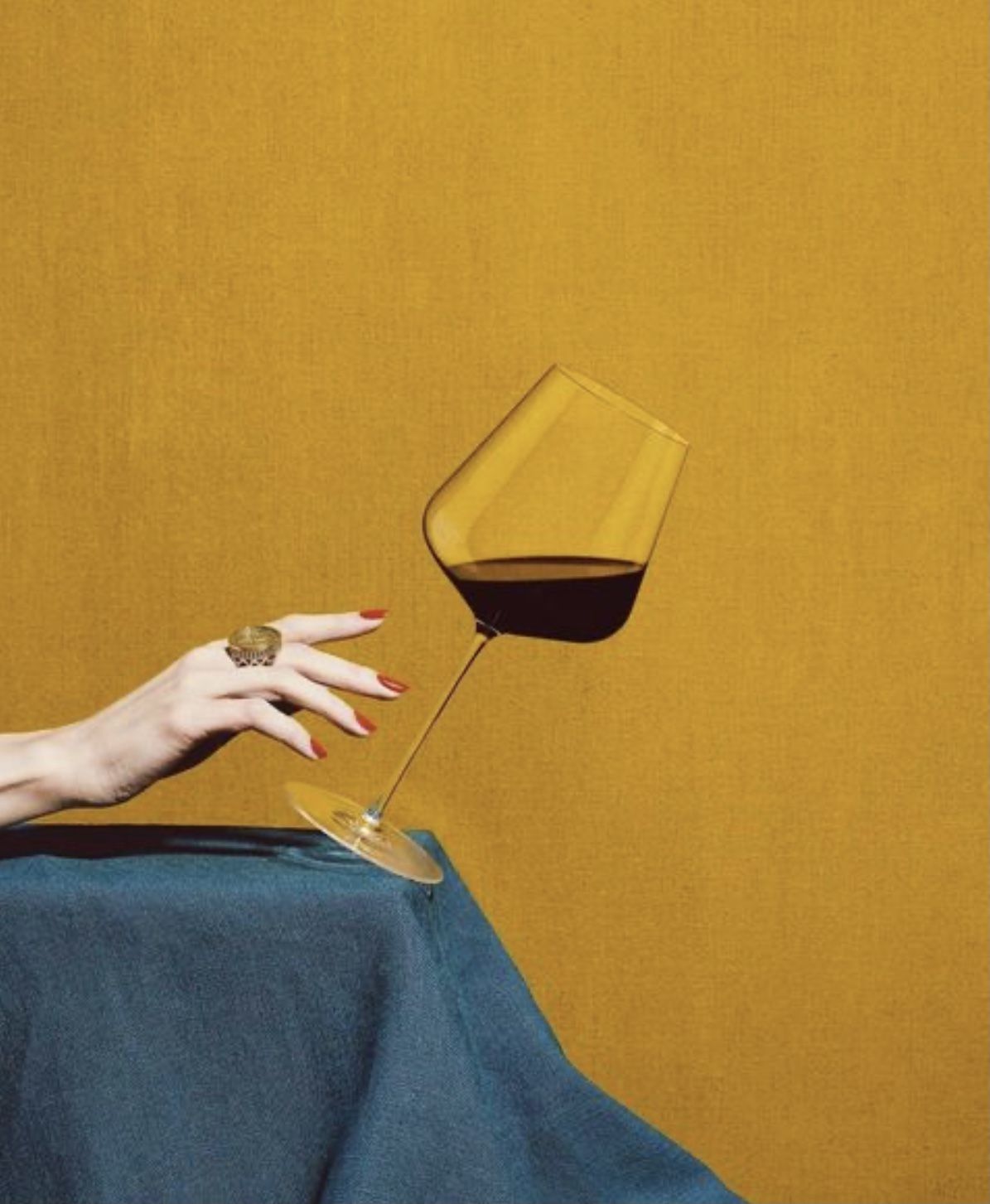 Hand Holding Wine Glass