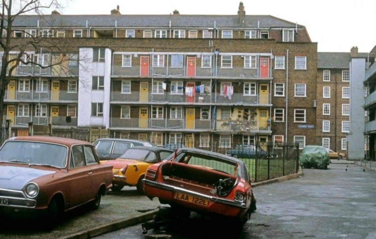 Vintage Cars in Front of Apartment Building