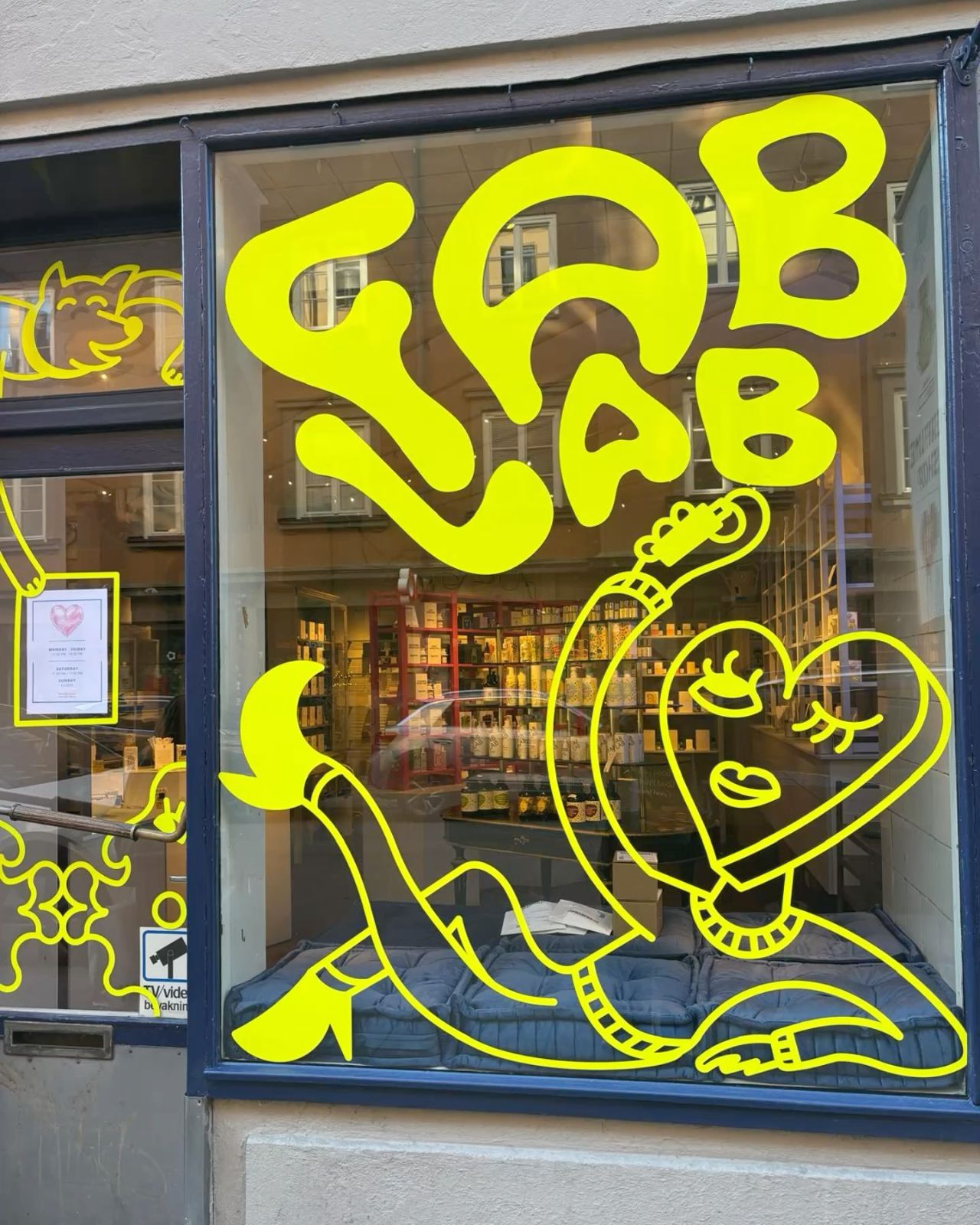 Yellow Neon Snake in Shop Window