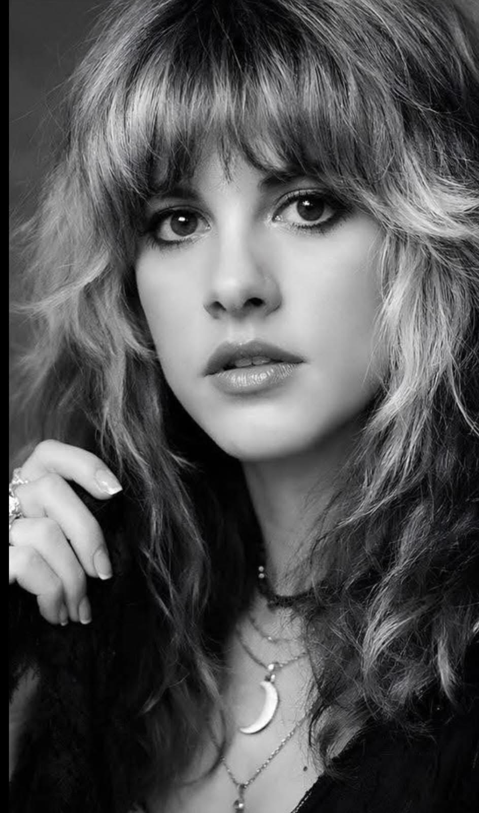 Glamorous Woman with Long Curly Hair