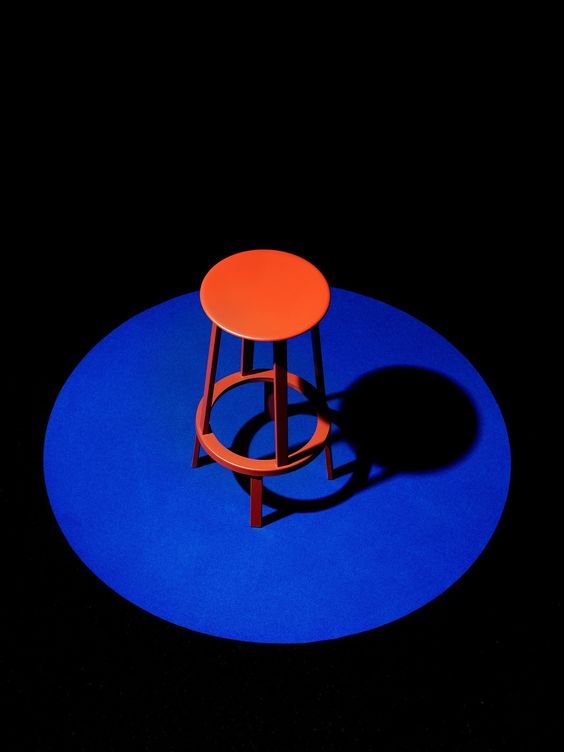 Orange Stool on Blue Circle