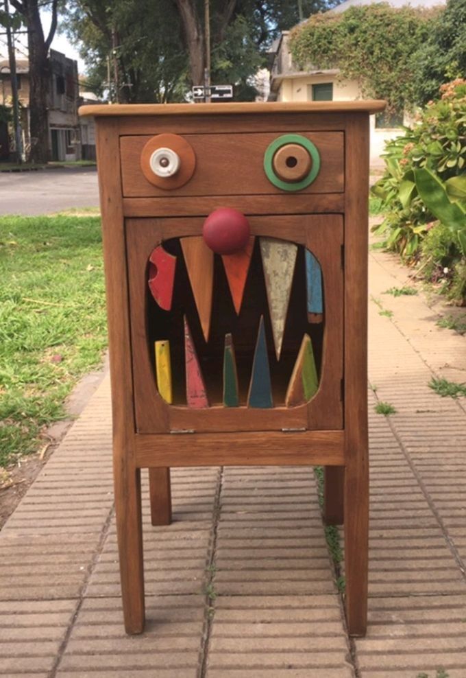 Colorful Wooden Cabinet with Abstract Artwork