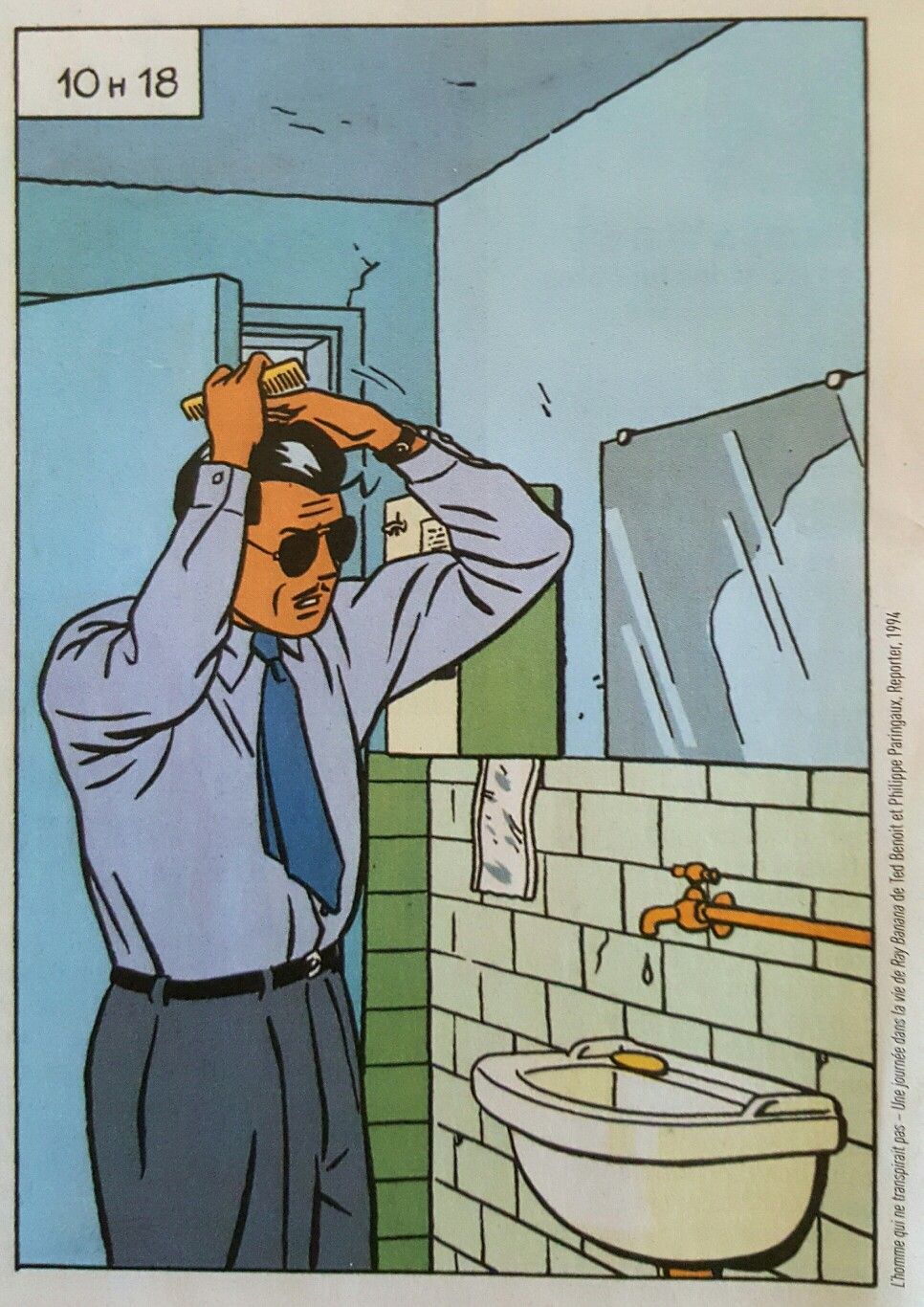 Man Brushing Hair in Bathroom